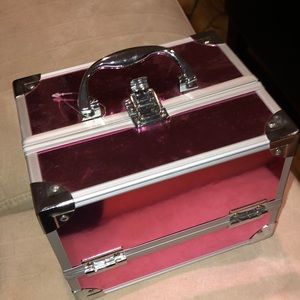 A hot pink multi-use compartment box